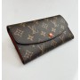 Different colored Lv purse