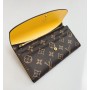 Different colored Lv purse